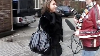 A real whore who has her big boobs photographed on the street while she goes to fuck with her partner